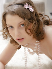 Glammed up teenie plugs pussy with a huge dildo