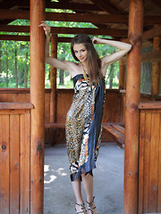 Sultry seductress Loretta A showcases her stunning tight body with ever-erect breasts, slim waist, and long, svelte legs.